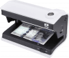 D30 counterfeit detector verifying banknote